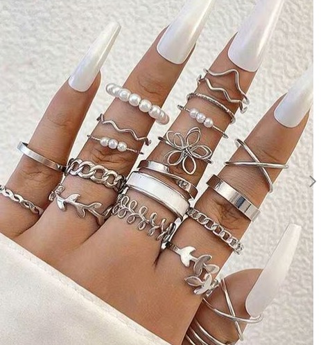 Womens silver ring pg of 10 pice
