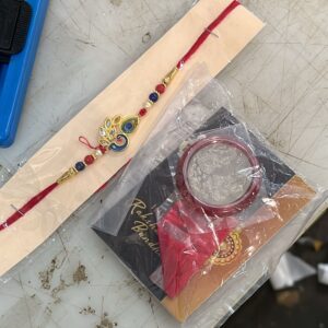 Beautiful Rakhi Silver Coin Sindoor Chawal Set