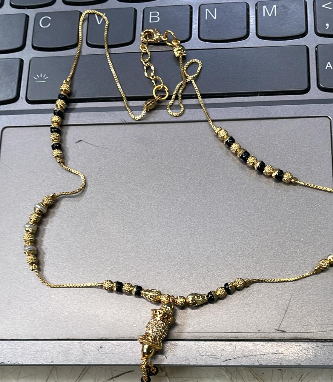 Women Golden And Black Stone Neck Chain