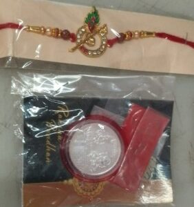 Red Rakhi With Silver Coin