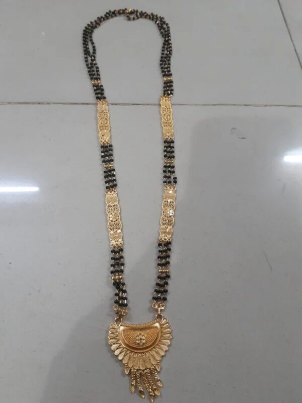 Brass And Glass Beads Golden And Black Party Wear Gold Plated Mangalsutra