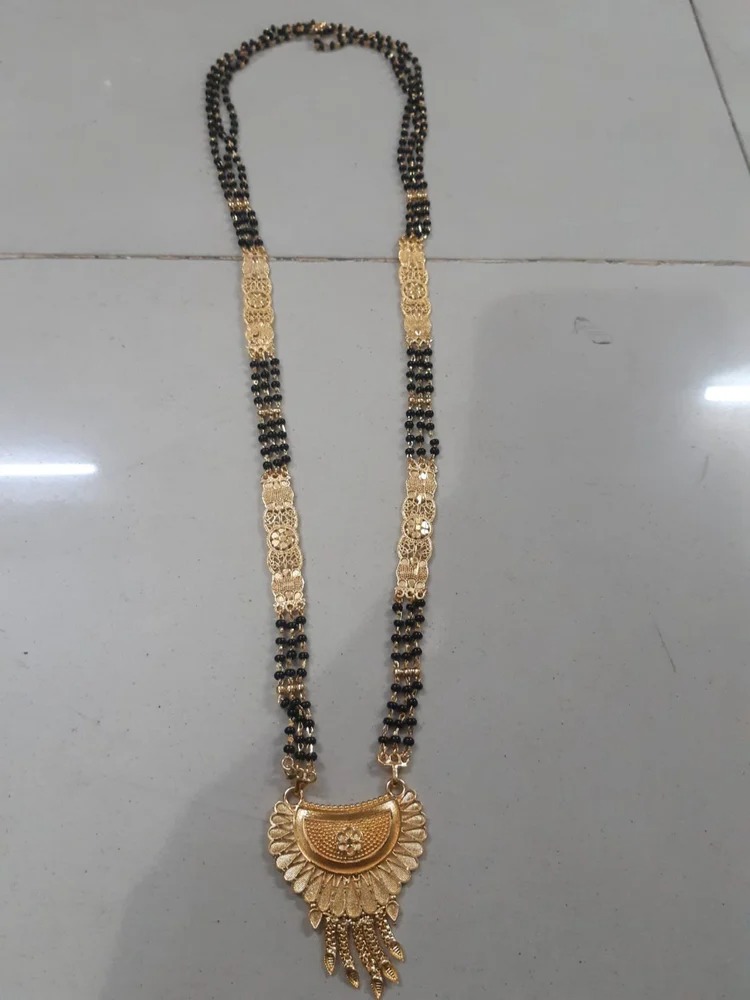 Brass And Glass Beads Golden And Black Party Wear Gold Plated Mangalsutra