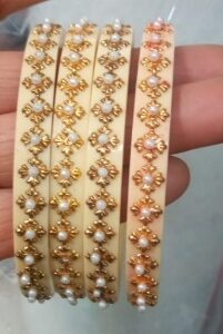 Beige Color Plastic Bangles 4 Pcs Size 2 Point 6