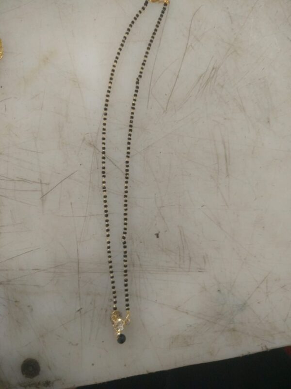 Women Black And Gold Necklace