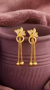 Women Dazzling Latkan Earrings Golden Colour