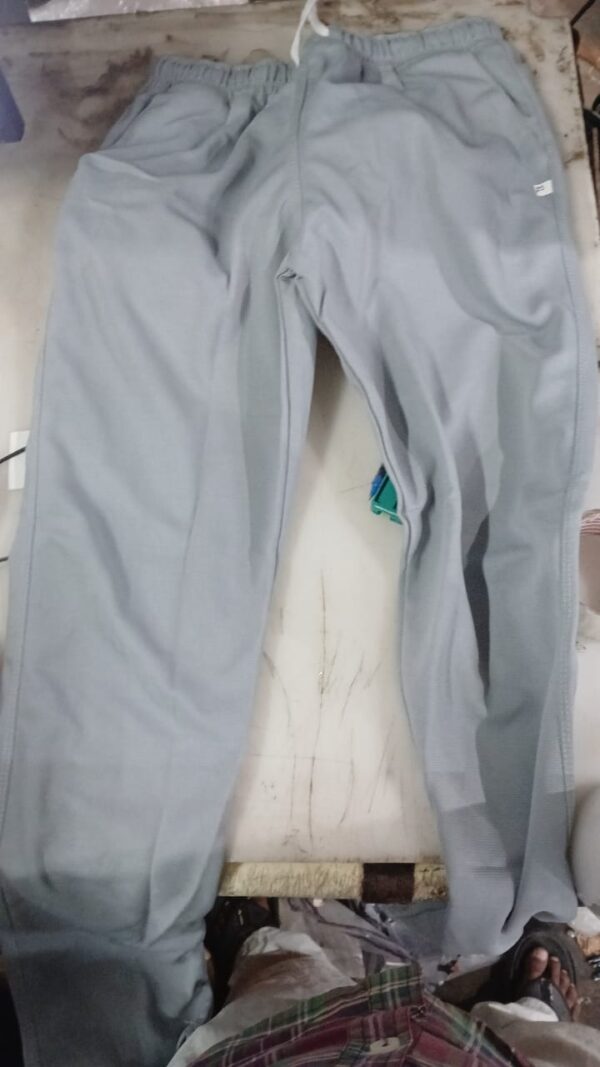 Stay Comfortable And FashionForward With Our MenS Solid Grey Track Pants Size M