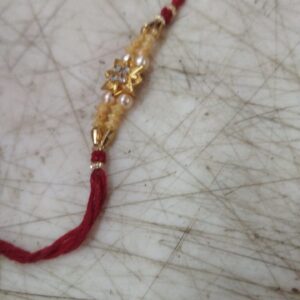 Red And Cream Color Moti Designer Rakhi