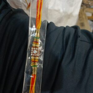 Fancy Rakhi With Metal Flower And Rudraksha For Indian Festival Raksha Bandhan Celebration