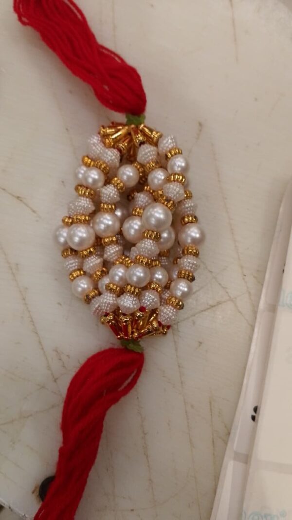White Moti Rakhi Pack Of 12