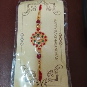 Golden Religious Designer Rakhi With Red Thread