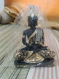 Decorative Statue Of Buddha In A Meditative Pose