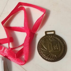 Metal Gold Medal With Red Ribbon