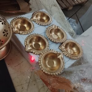 Set Of 12 Golden Diya Urlis Home Decorations