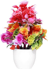 Small Bouquet Of Artificial Flowers In A White Pot