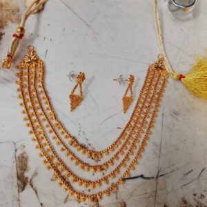 Goldplated Multilayered Lohori Necklace Set With Matching Earrings.