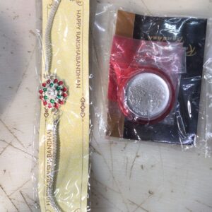 Artificial Silver Plated Rakhi With Rice Sindoor Set