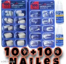 Two Packages Of Artificial Nail Tips And Two Tubes Of Nail Glue