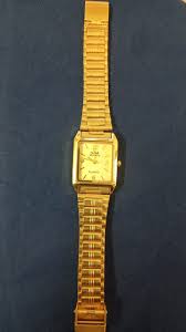 Premium Golden Analog Mens Watch With Day Date Formal Square Dial Timepiece